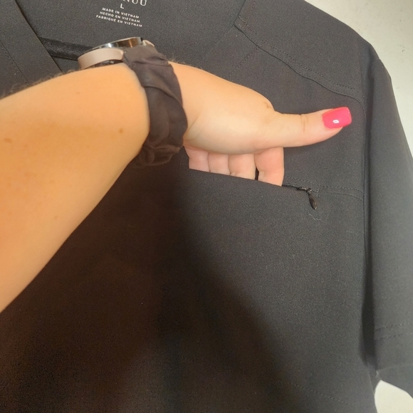 Jaanuu black scrub top. 1 zip chest pocket.  Short sleeve v-neck. Women's size L - Picture 2 of 14